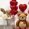 Lovely teddy bear balloon with hearts