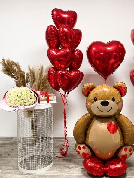 Lovely teddy bear balloon with hearts